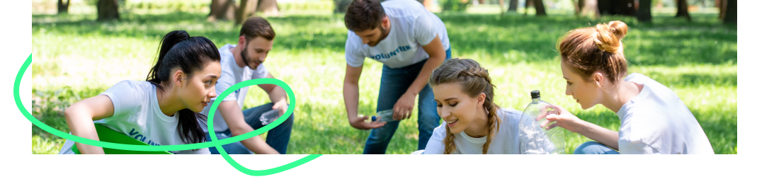Volunteers picking up litter in a park