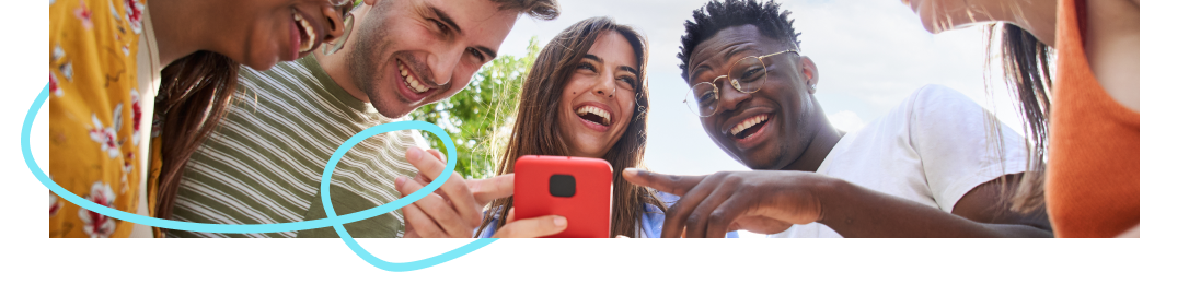 Group of smiling employees around a smartphone